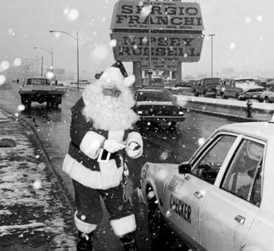 Photograph of man in Santa Claus costume, Las Vegas, 1974