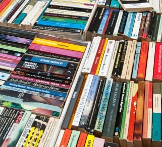 Simplify acquisition, deselection and accreditation processes Boxes of books