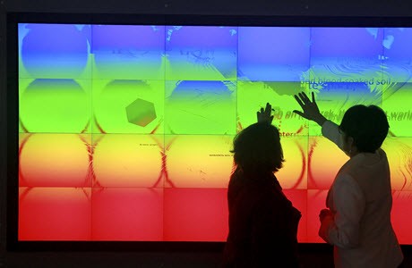 People using the Christie MicroTile Visualization Wall at Connecticut College