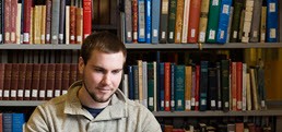 Student in The University of Winnipeg's library