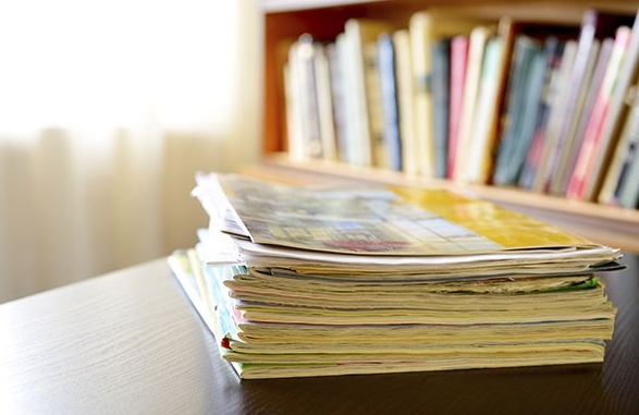 Magazines on table in library